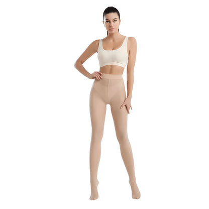 A full-body image of a female model wearing light, nude-colored Ultra-Sheer Slimming Tights and a cream-colored sports bra, posing against a white background."